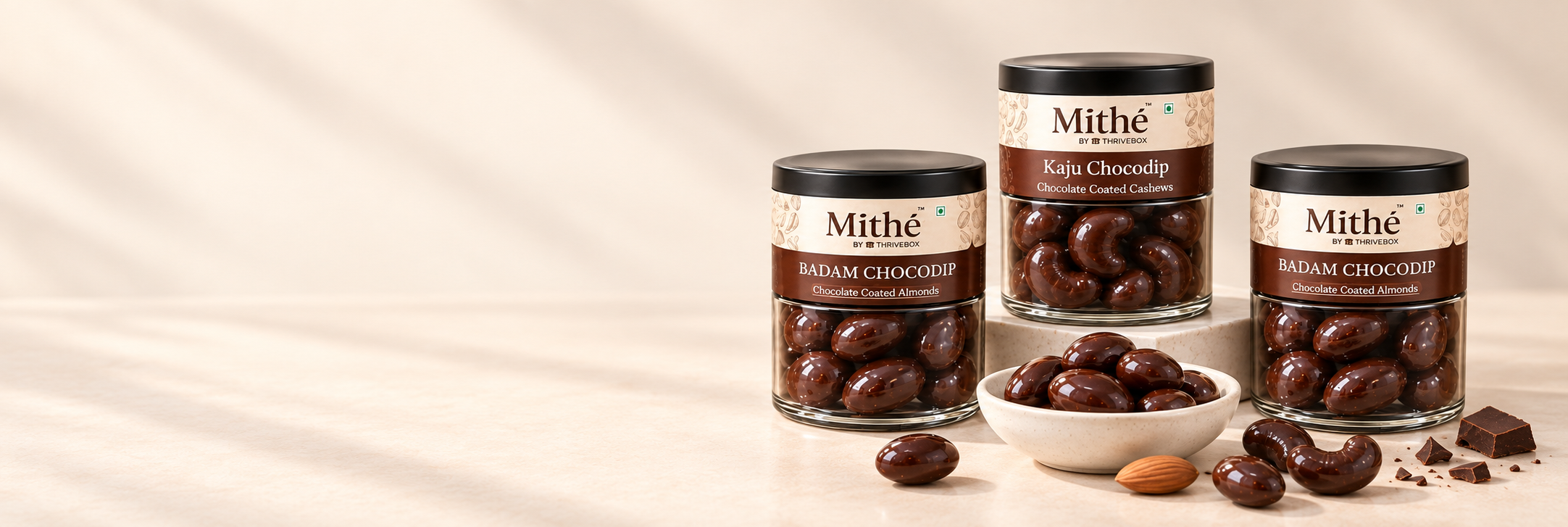 Mithe Chocodip jars with black lids and branded cream labels